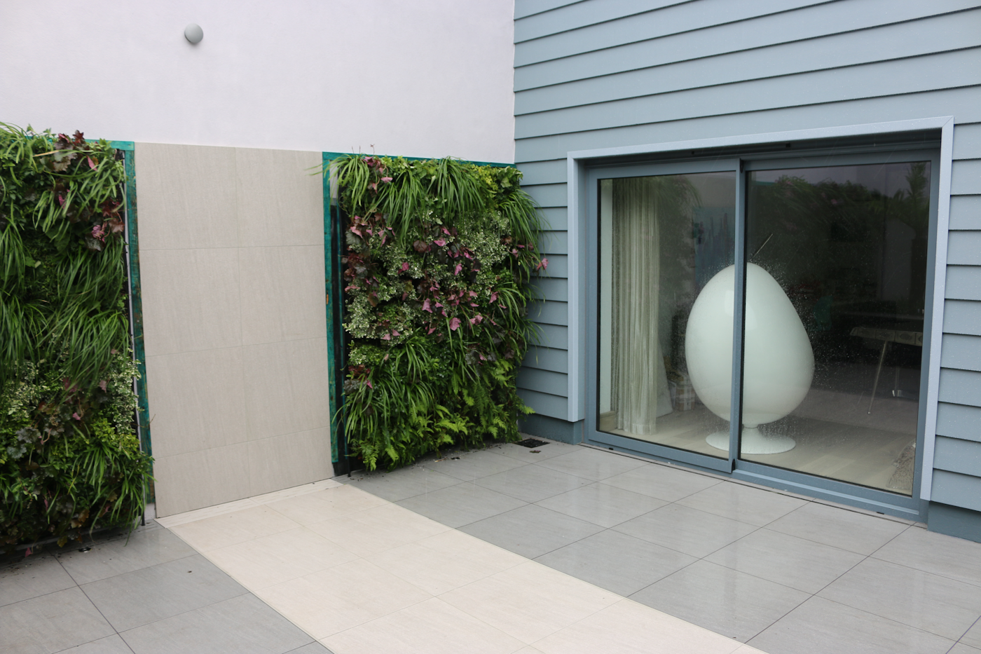 Two Living Walls At A Home In Jersey, Creating A Welcoming Patio Area