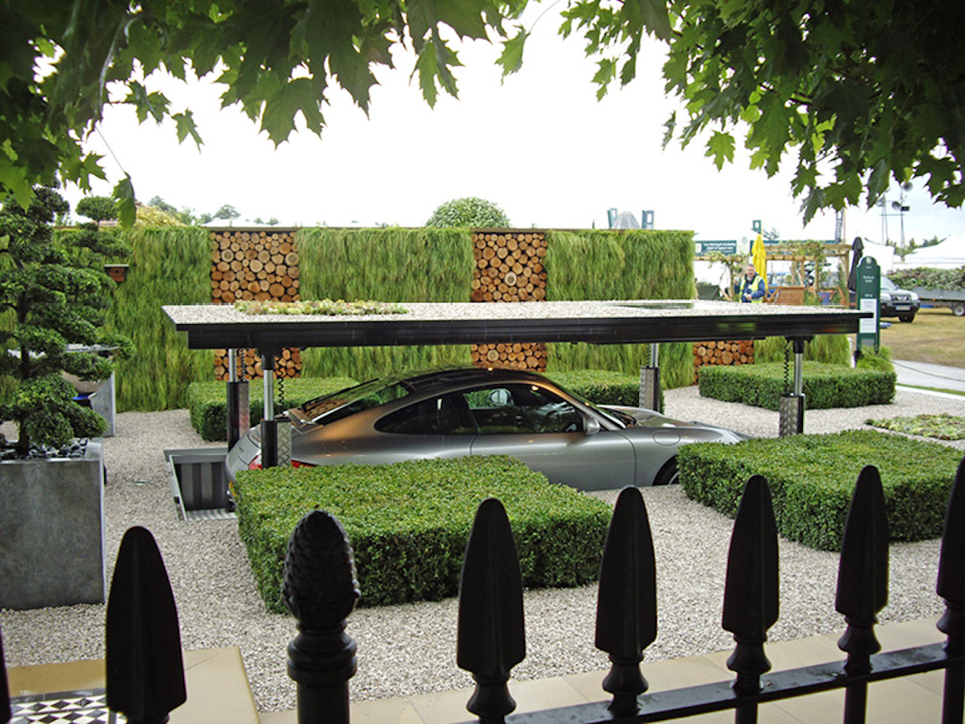 Car Coming out of Carport with Surrounding Greenery at Chelsea Flower Show 2008