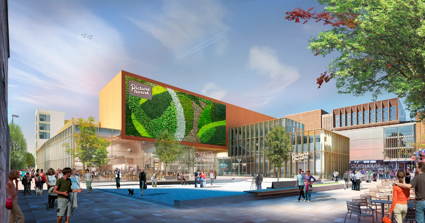 visual of a market square with a green wall