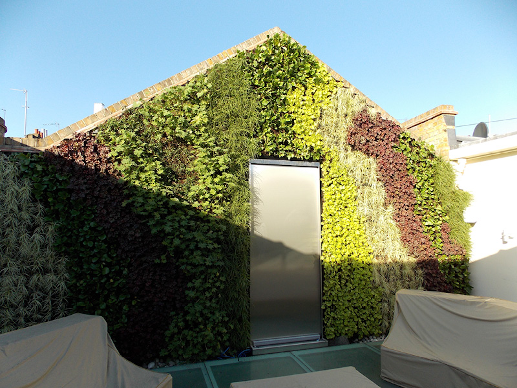 gabled living wall in an outdoor living area