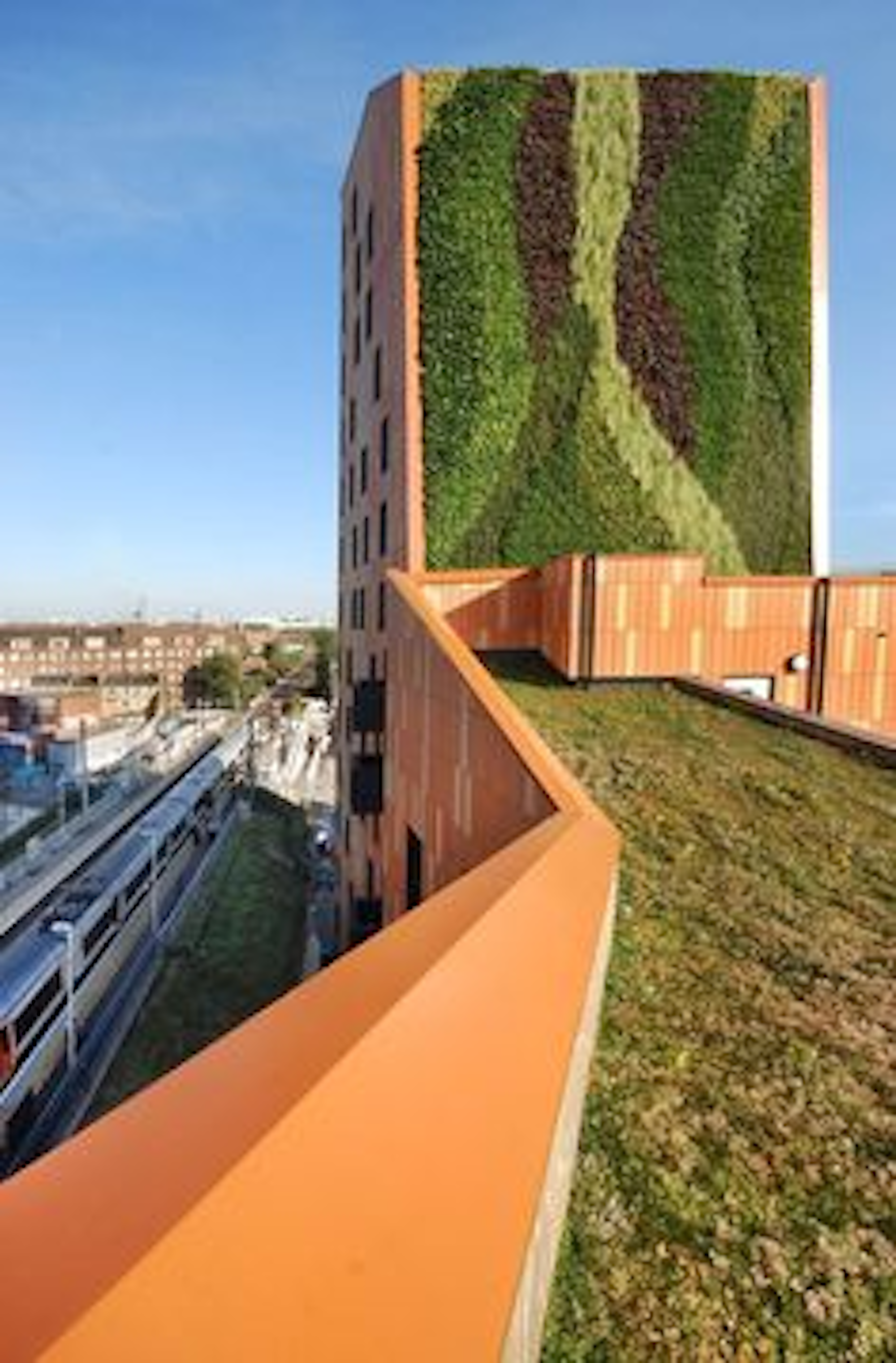living wall and sedum green roof on apartment building and rooftop