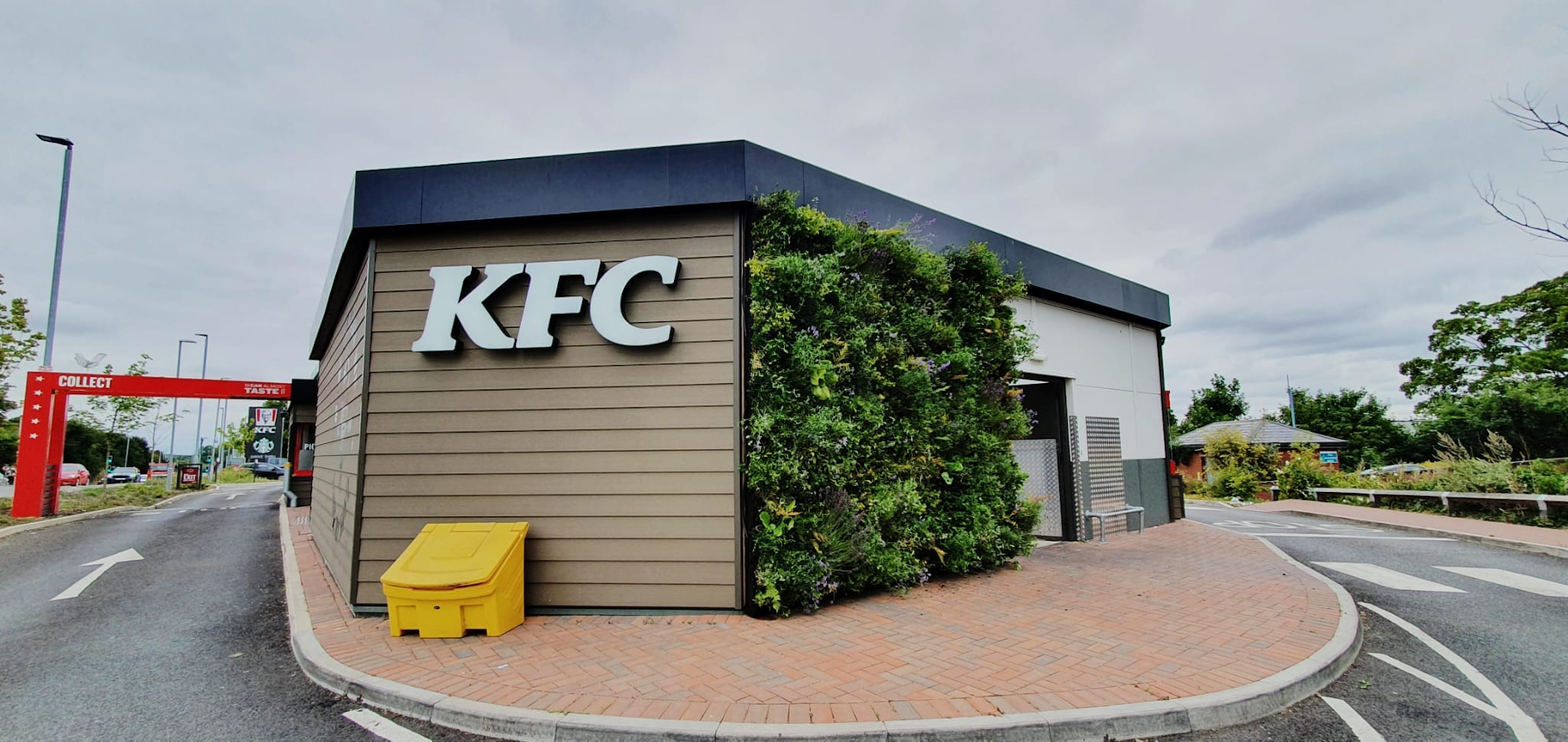 Lush living wall next to KFC sign