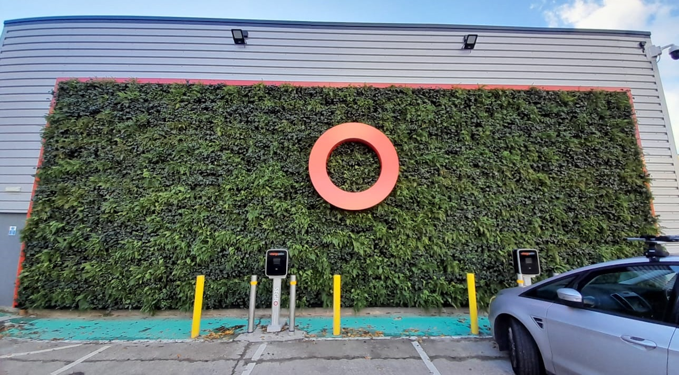 green wall with red signage