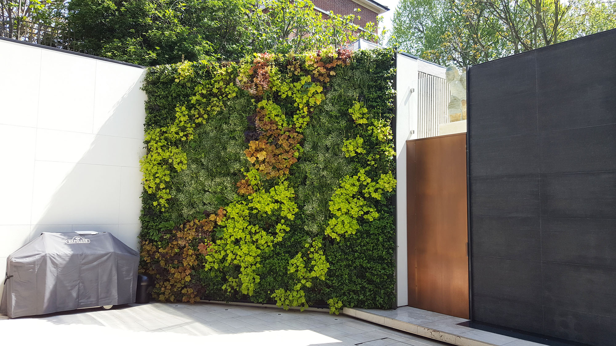 Patterned Planted Living Green Wall At Private Residence Patio Area