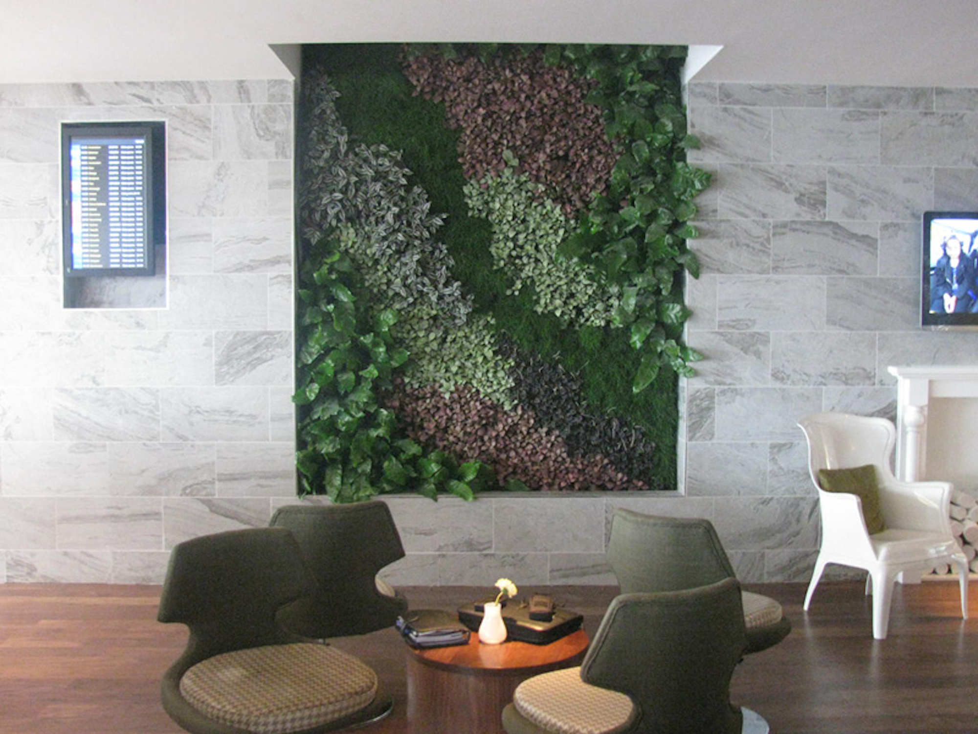seating in airport lounge with living wall
